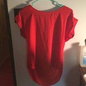 Red loose high low shirt